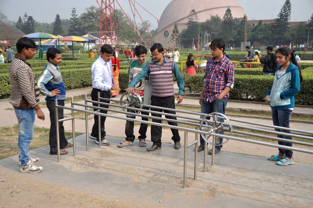 Moment of Inertia and Rotational Dynamics - Systems of Particles and ...